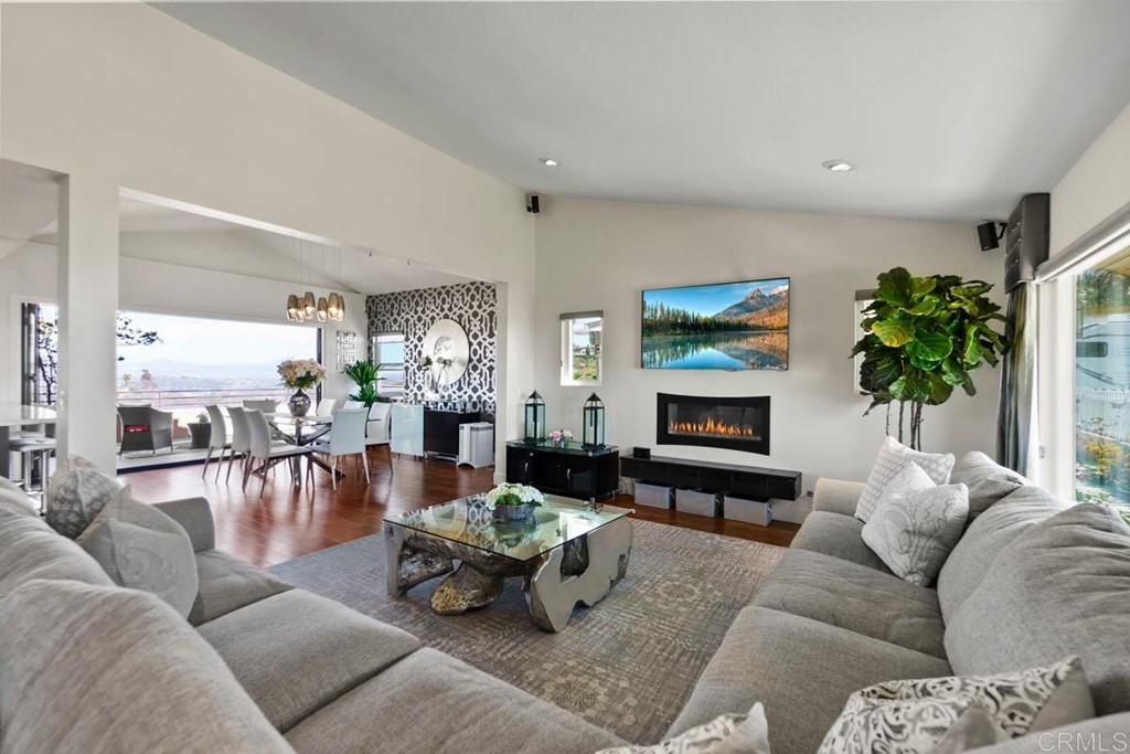 777 Phoenix Way San Marcos, CA 92078 - Photo 7 of 75 a living room with furniture and a fireplace