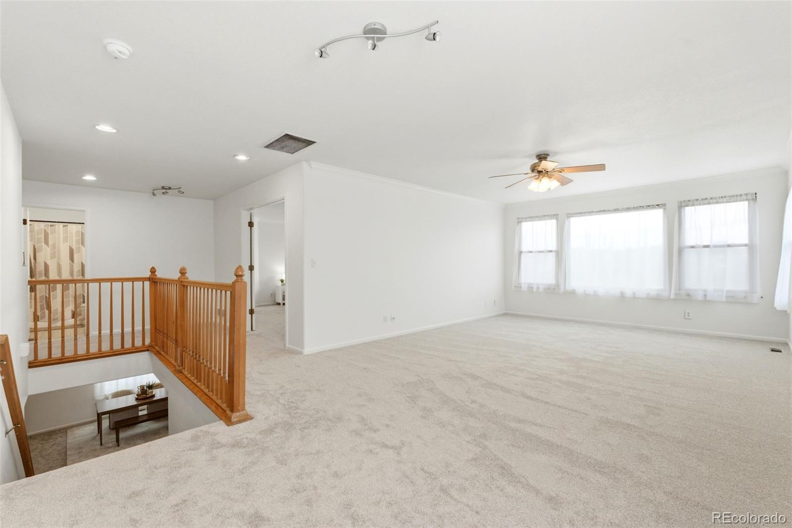 3033 East 108th Drive Northglenn, CO 80233 - Photo 15 of 50 a view of an empty room with a window