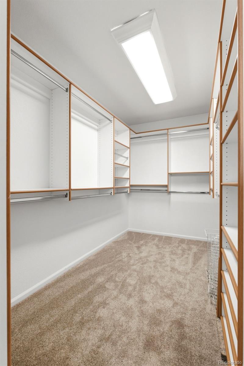 3033 East 108th Drive Northglenn, CO 80233 - Photo 23 of 50 an empty room with windows