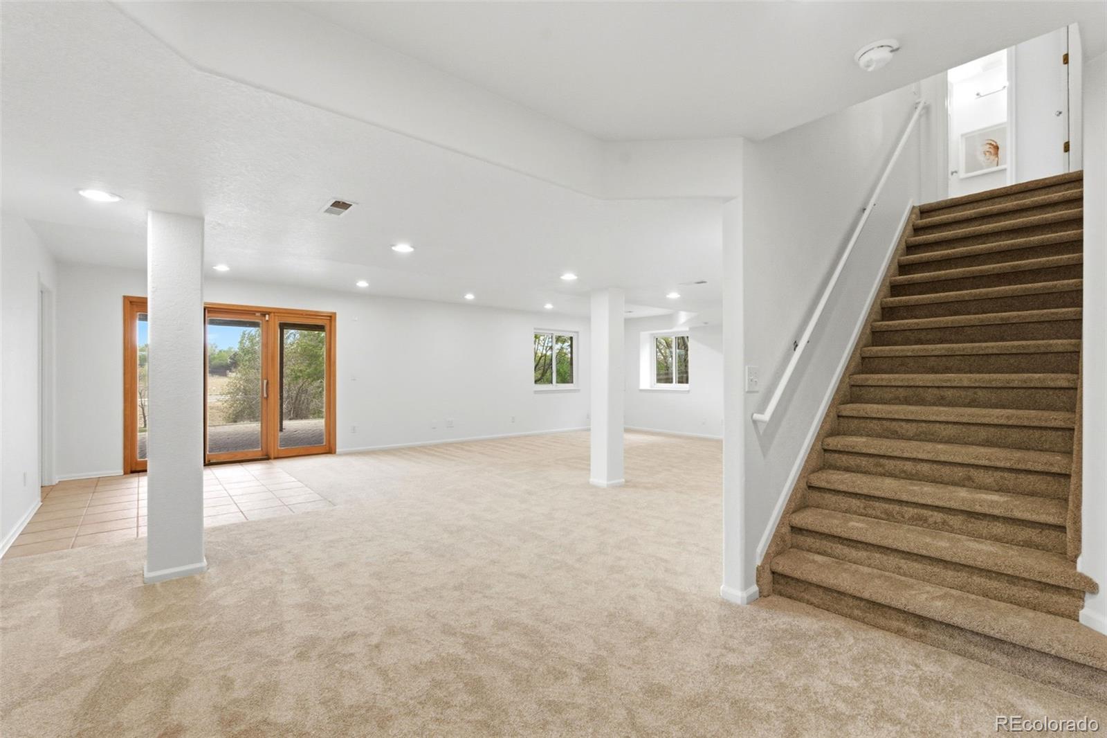 3033 East 108th Drive Northglenn, CO 80233 - Photo 29 of 50 a view of an entryway with stairs