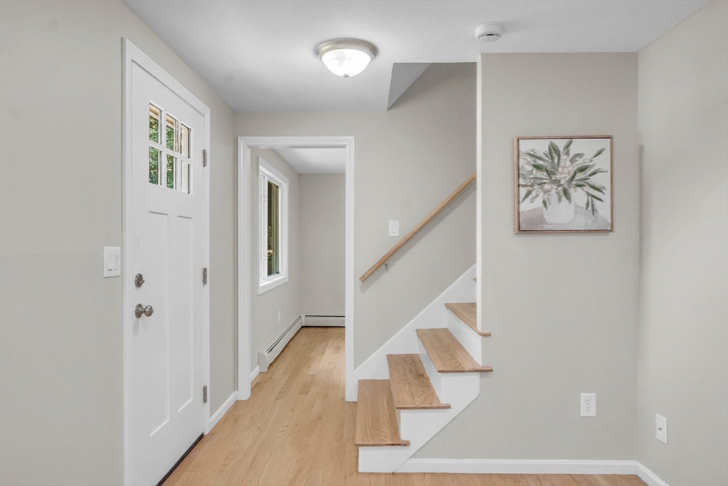 100 Dunstable Road North Chelmsford, MA 01863 - Photo 14 of 30 a view of an entryway with wooden floor