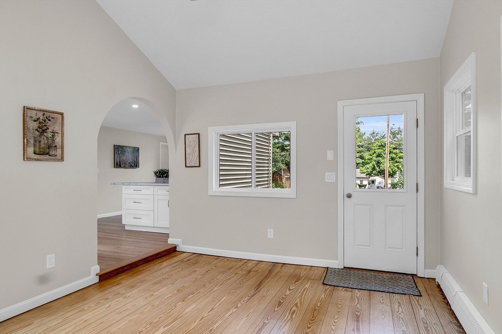100 Dunstable Road North Chelmsford, MA 01863 - Photo 3 of 30 wooden floor in an empty room with a window