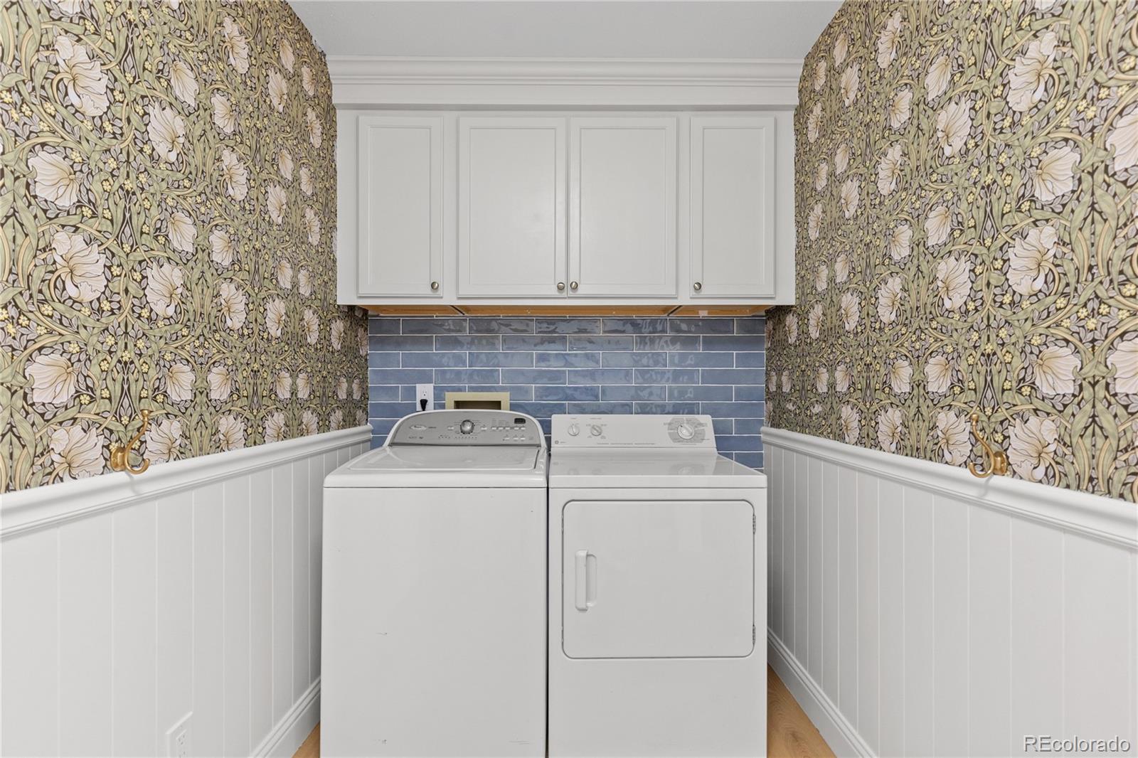 9362 Cornell Circle Highlands Ranch, CO 80130 - Photo 18 of 44 a view of washer and dryer