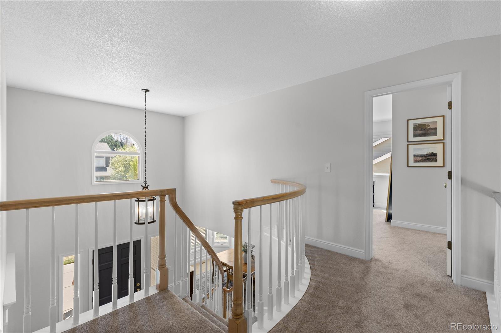 9362 Cornell Circle Highlands Ranch, CO 80130 - Photo 24 of 44 a view of entryway with stairs