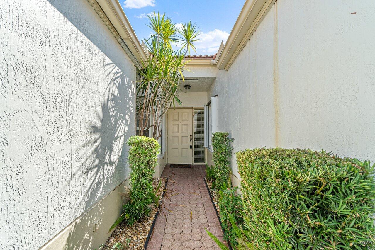 6118 Heliconia Road Delray Beach, FL 33484 - Photo 14 of 30 front entrance