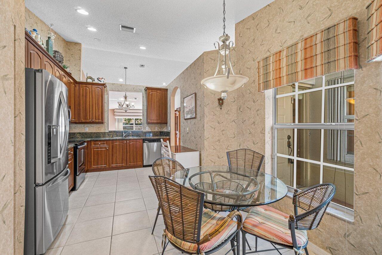 6118 Heliconia Road Delray Beach, FL 33484 - Photo 4 of 30 updated kitchen with breakfast area