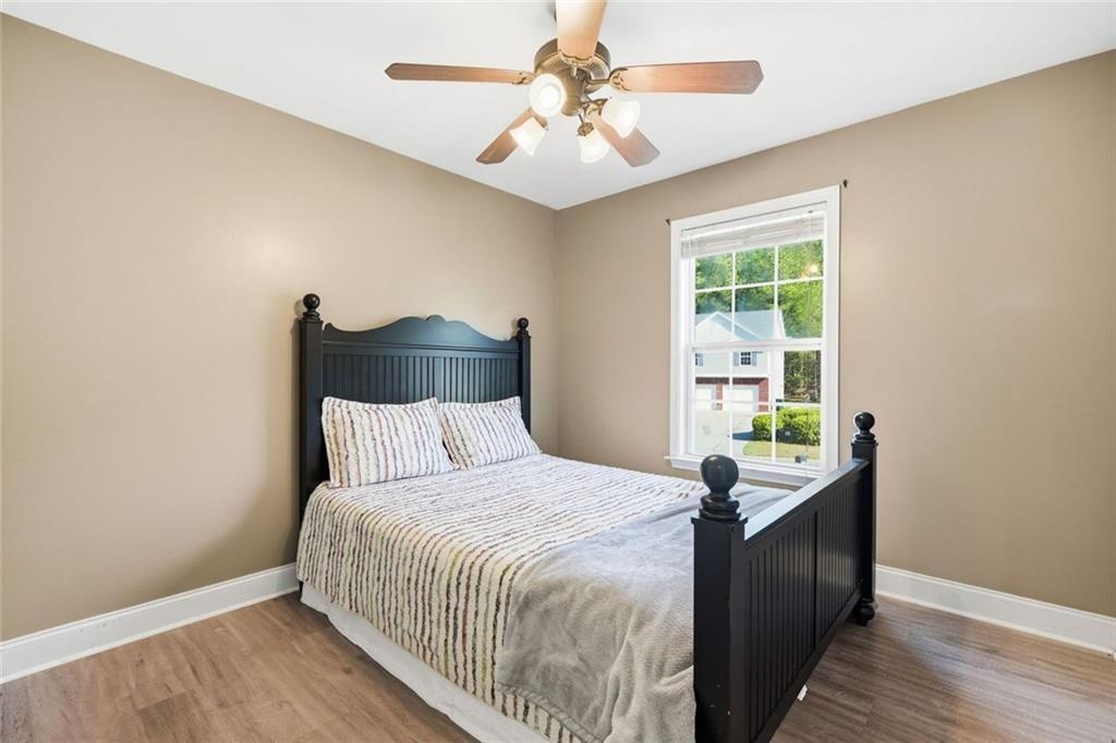 103 Denali Drive Calhoun, GA 30701 - Photo 28 of 39 a bedroom with a bed and a window