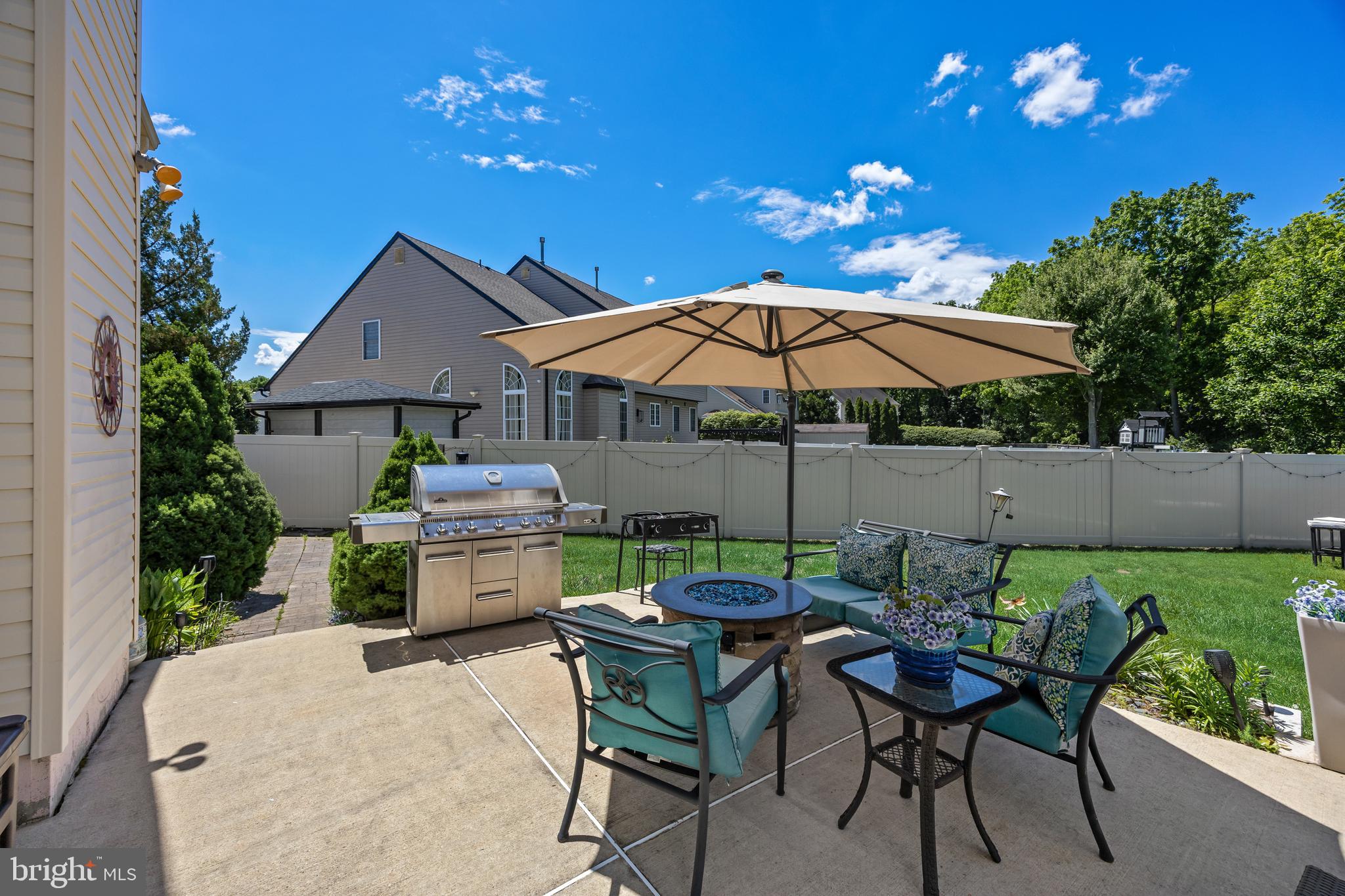 2 Rothbury Drive Lumberton, NJ 08048 - Photo 46 of 54 a patio with a table and chairs
