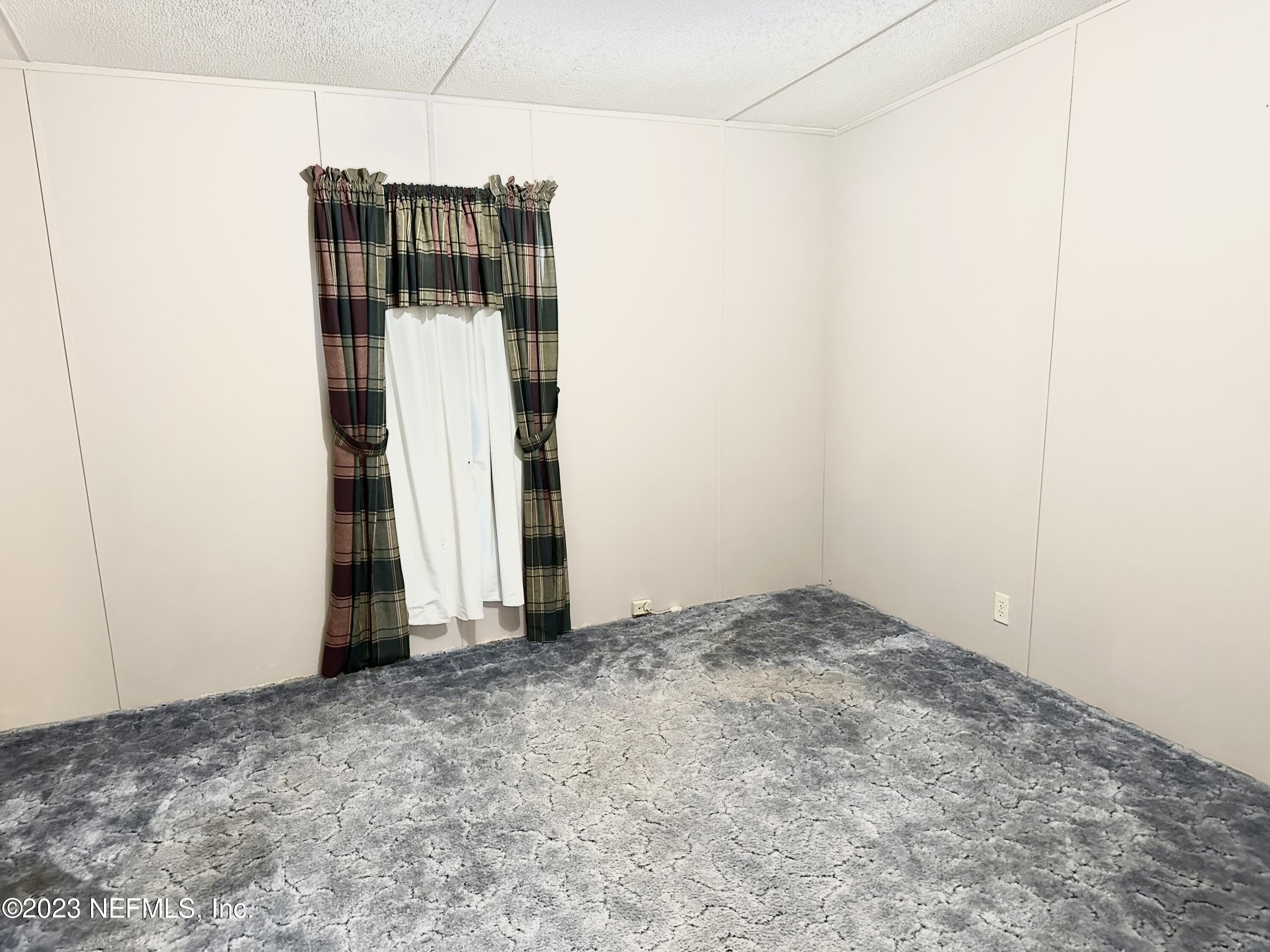 15644 Sears Road Jacksonville, FL 32218 - Photo 15 of 24 a view of room and front door