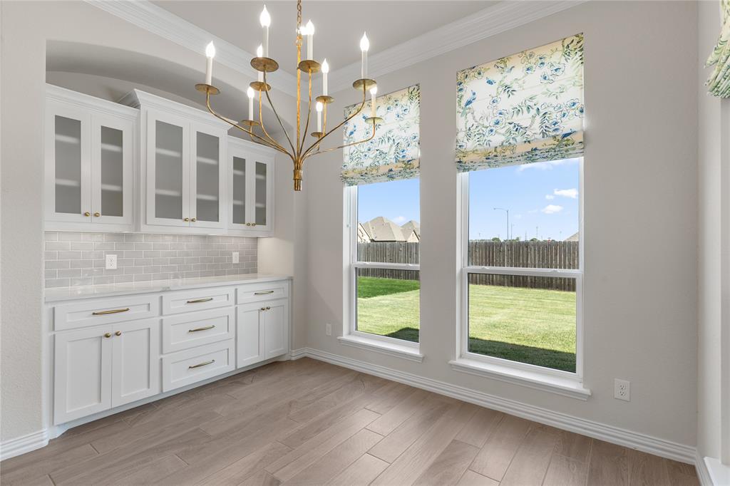 5682 Blackstone Drive Wichita Falls, TX 76310 - Photo 16 of 31 a spacious bathroom with a granite countertop sink mirror and large window
