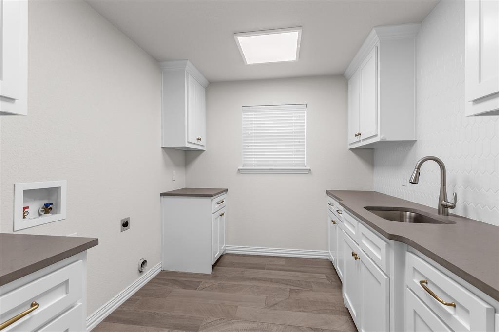 5682 Blackstone Drive Wichita Falls, TX 76310 - Photo 17 of 31 a view of a kitchen with sink and dishwasher