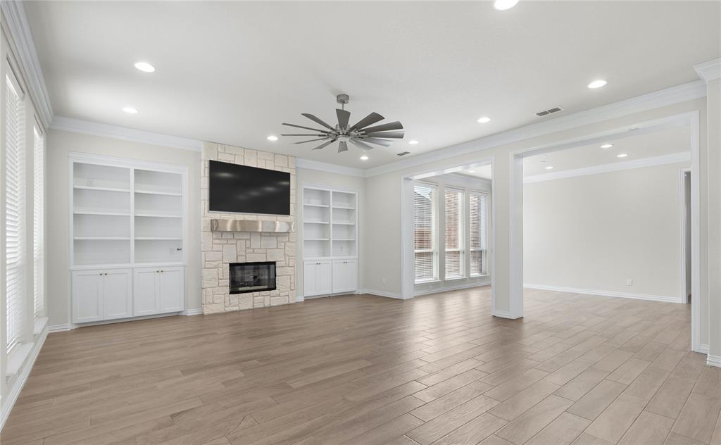 5682 Blackstone Drive Wichita Falls, TX 76310 - Photo 8 of 31 a view of an empty room with a fireplace and a window
