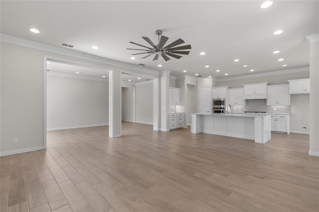 5682 Blackstone Drive Wichita Falls, TX 76310 - Photo 10 of 31 a view of a kitchen with a sink and a refrigerator