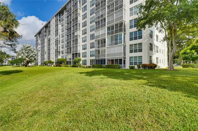 a view of building with yard
