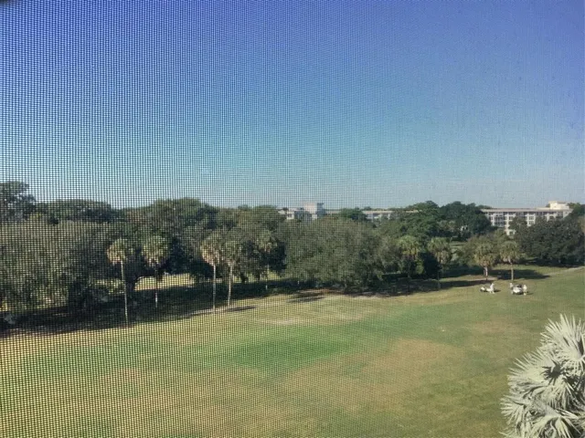 a view of a water with mountains in the background
