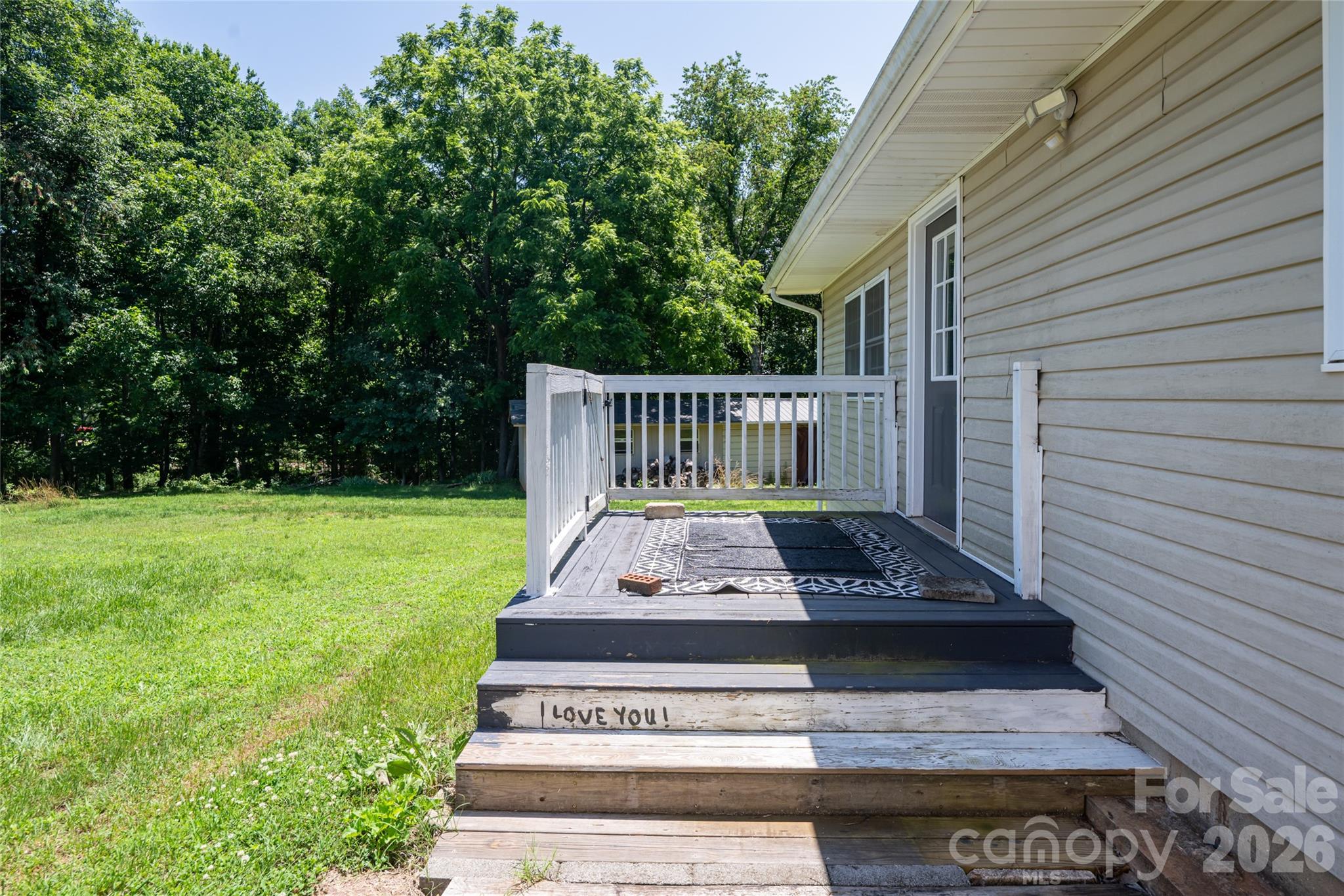 2800 Coxe Road Tryon, NC 28782 - Photo 35 of 40 a view of a patio with a table