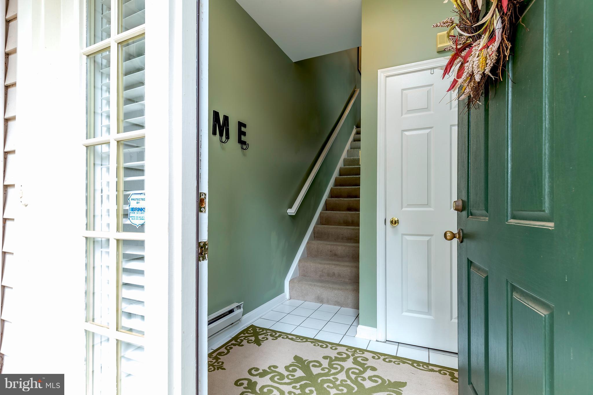 1300 Windleaf Drive, Unit B Reston, VA 20194 - Photo 5 of 23 Garage and Front Door Entry