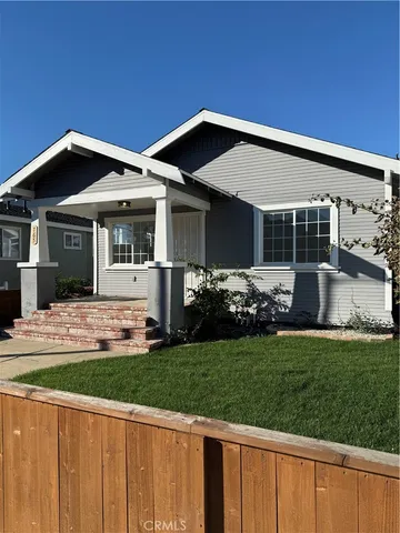 a view of a livingroom with wooden floor