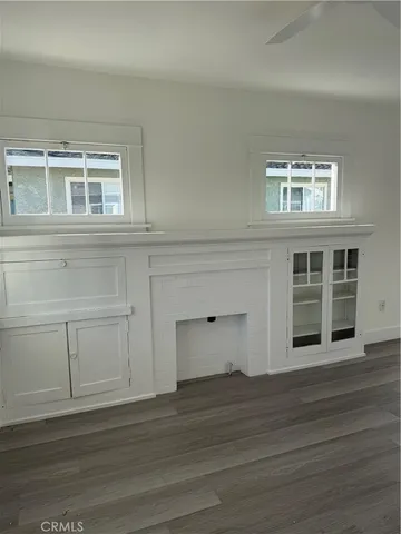 a view of a livingroom with wooden floor