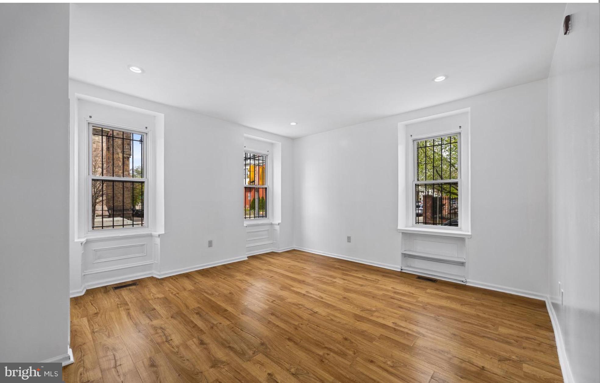 3800 Spring Garden Street, Unit 1 Philadelphia, PA 19104 - Photo 7 of 10 a view of empty room with windows