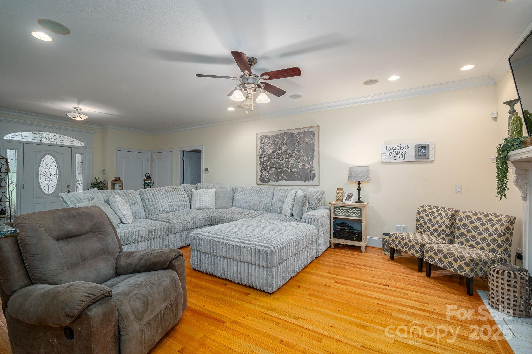 543 Roy Eaker Road Cherryville, NC 28021 - Photo 12 of 43 a living room with furniture and a large mirror