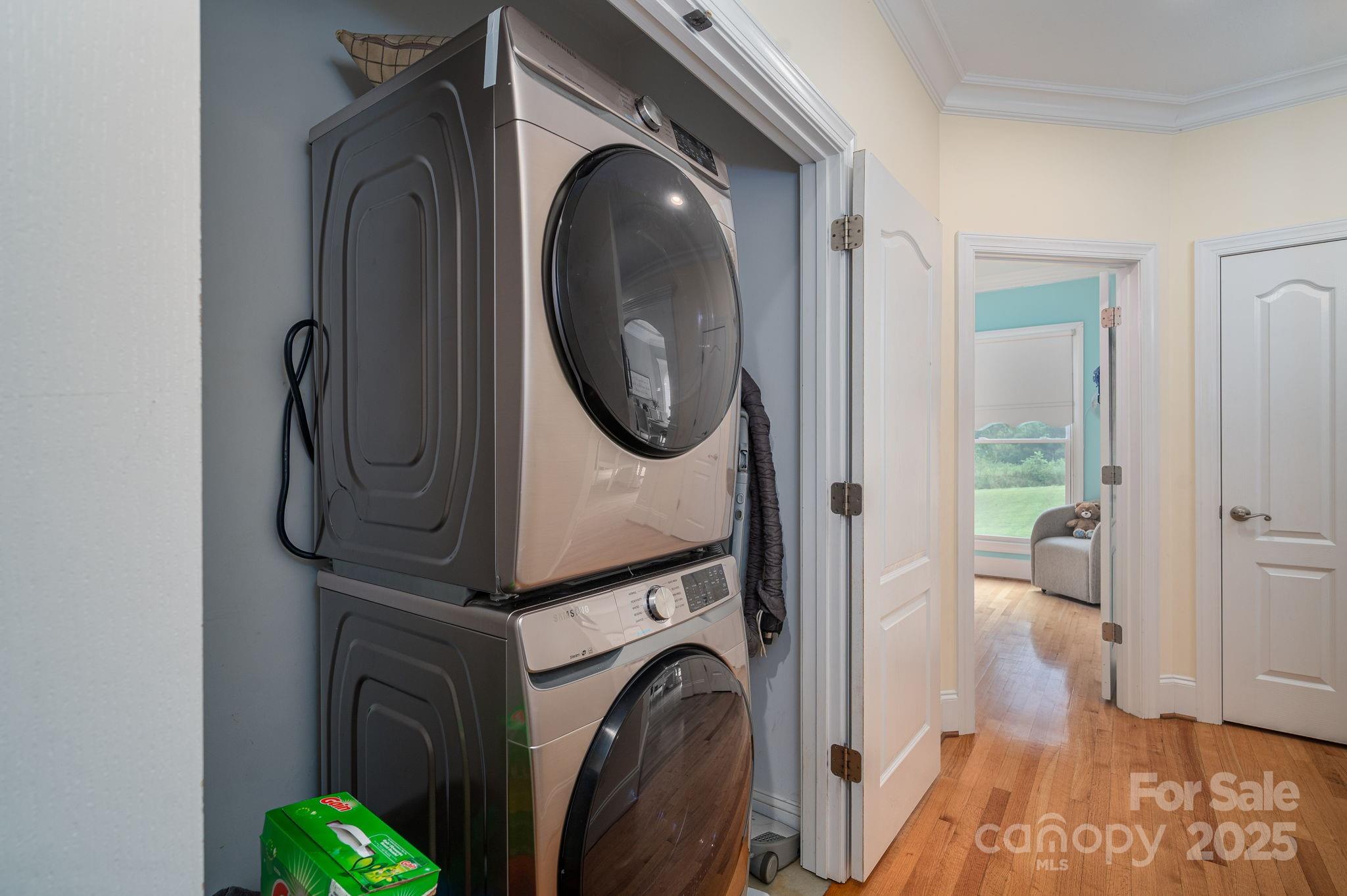 543 Roy Eaker Road Cherryville, NC 28021 - Photo 27 of 43 a view of a storage and utility room with washer and dryer