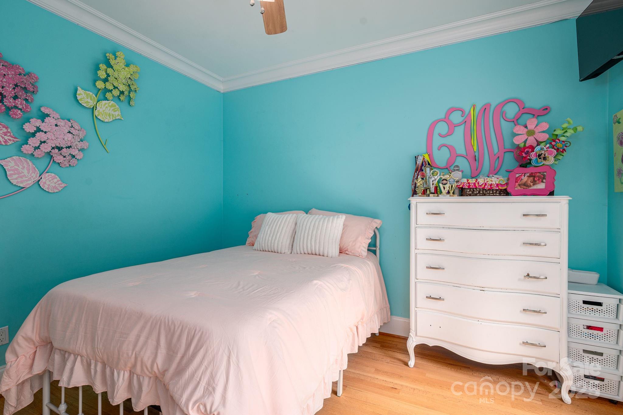 543 Roy Eaker Road Cherryville, NC 28021 - Photo 30 of 43 a bedroom with a bed and a dresser