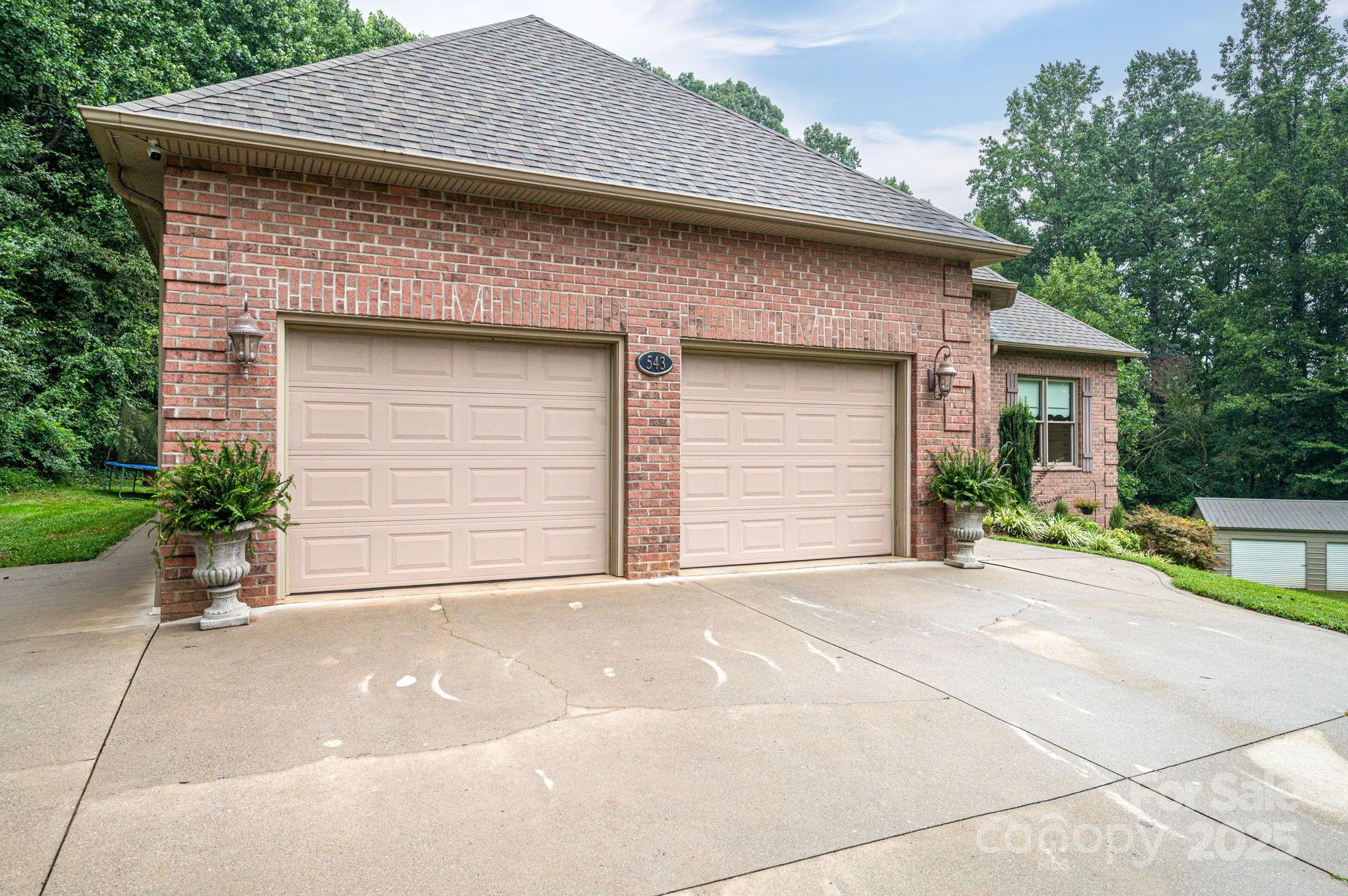 543 Roy Eaker Road Cherryville, NC 28021 - Photo 3 of 43 a front view of a house with a garage