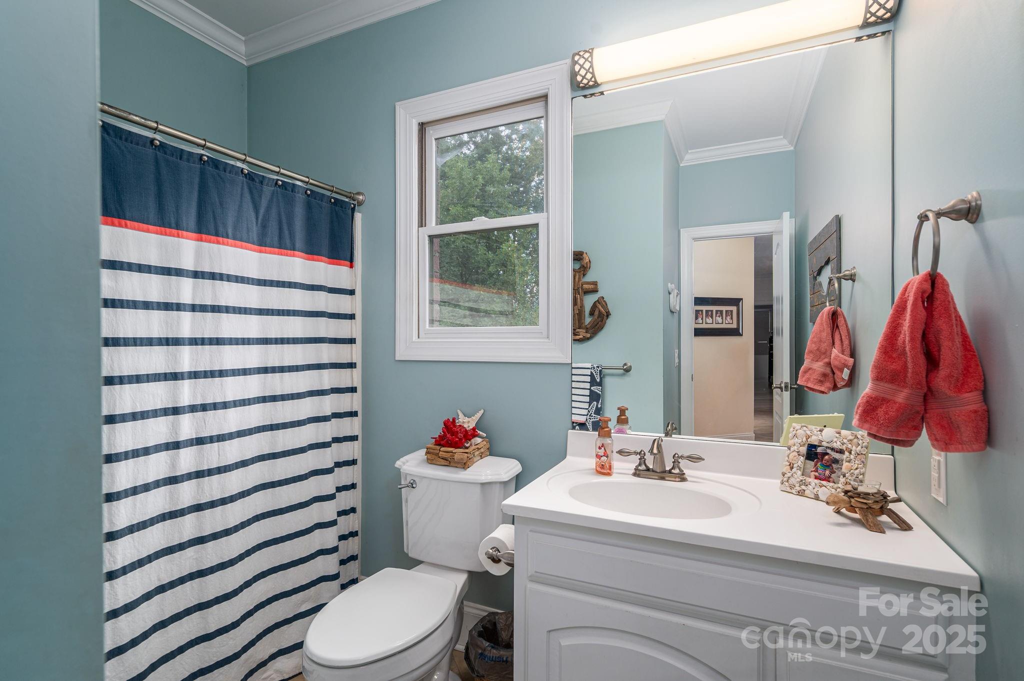 543 Roy Eaker Road Cherryville, NC 28021 - Photo 31 of 43 a bathroom with a sink toilet and shower