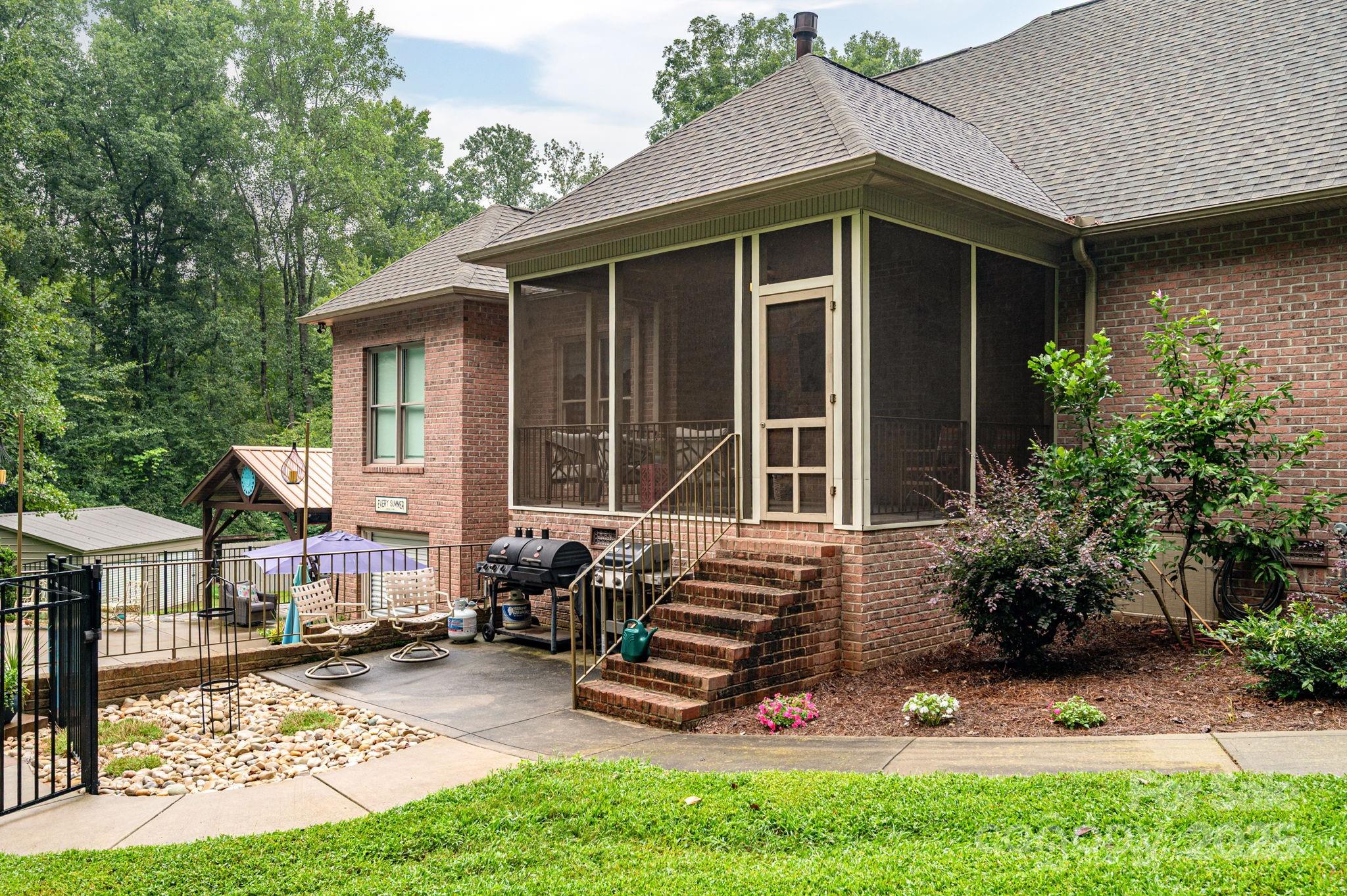 543 Roy Eaker Road Cherryville, NC 28021 - Photo 35 of 43 a backyard of a house with seating space