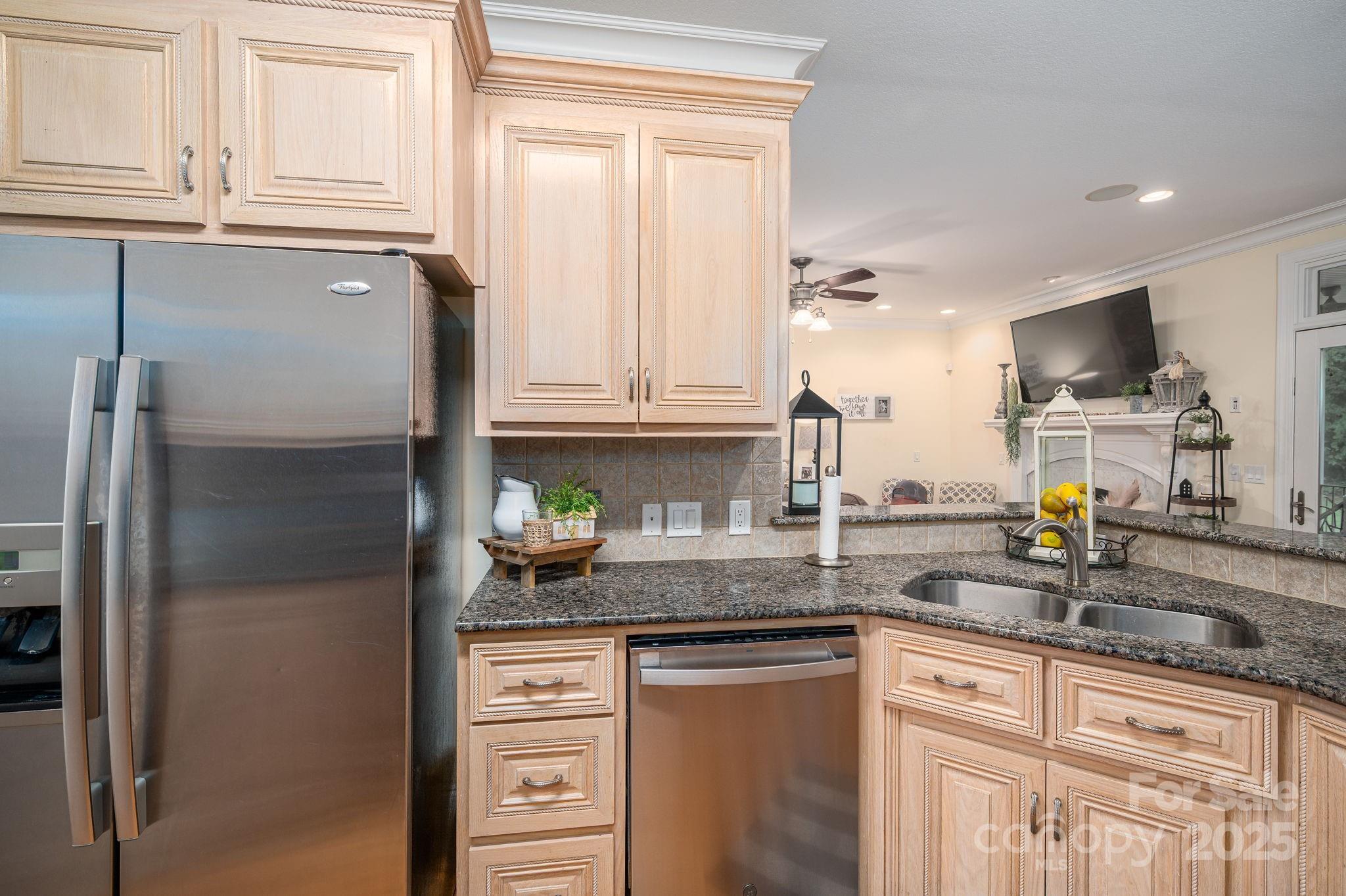 543 Roy Eaker Road Cherryville, NC 28021 - Photo 43 of 43 a kitchen with stainless steel appliances granite countertop a refrigerator and a sink