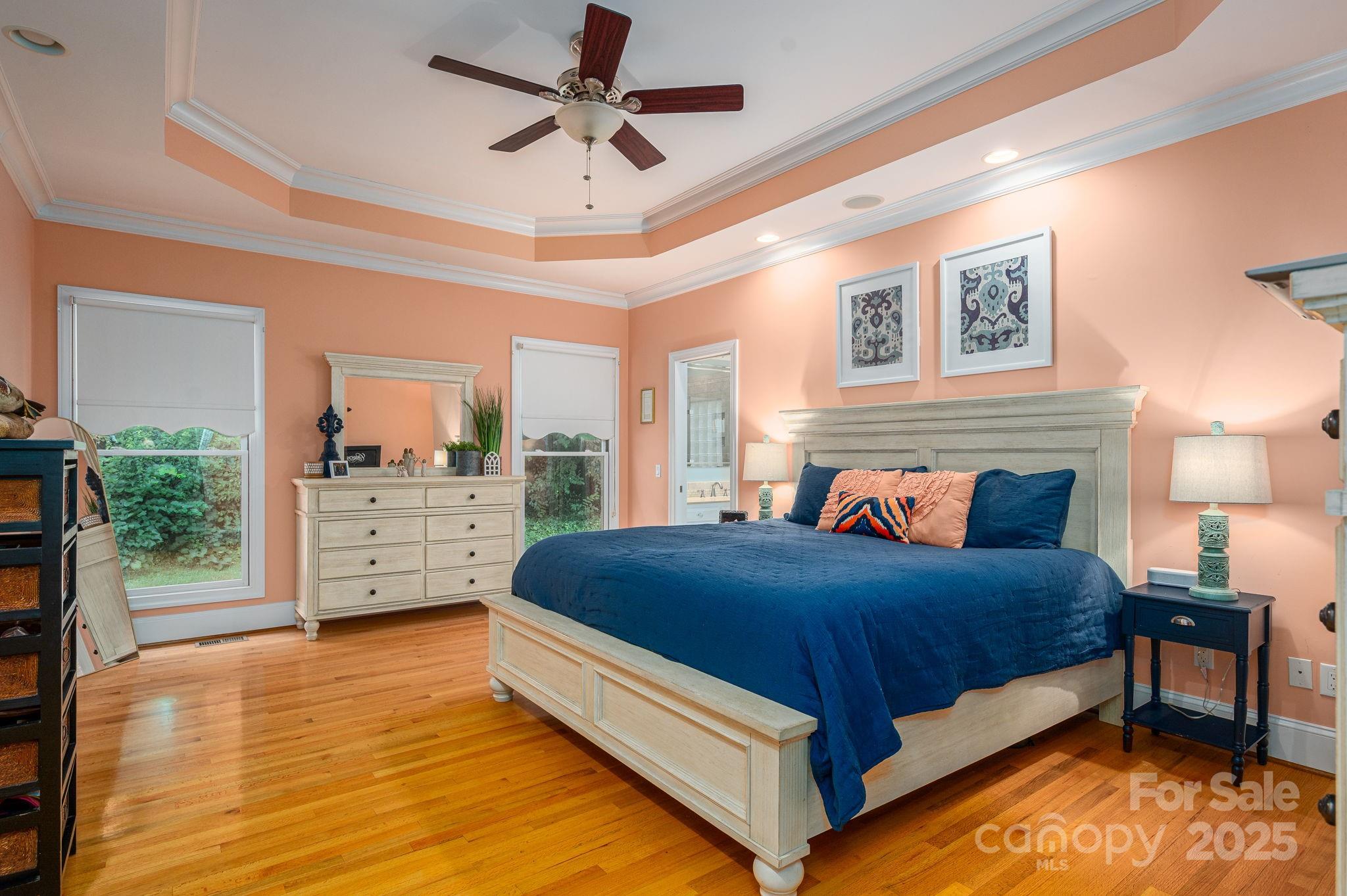 543 Roy Eaker Road Cherryville, NC 28021 - Photo 8 of 43 a bedroom with a bed chandelier and a window