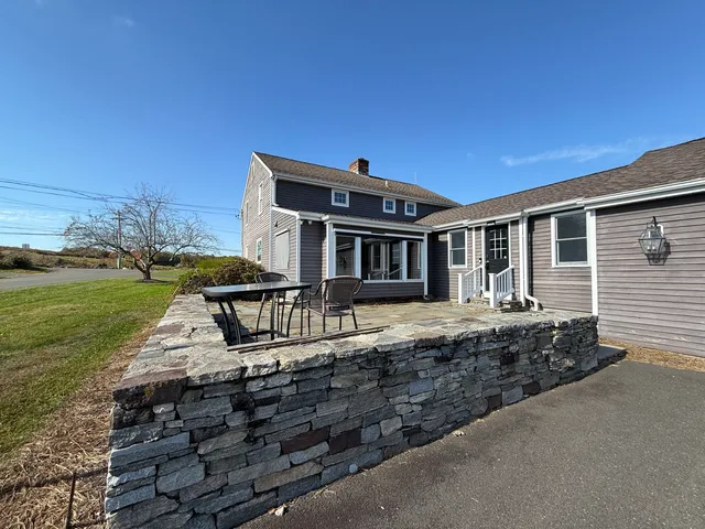 a house view with a garden space