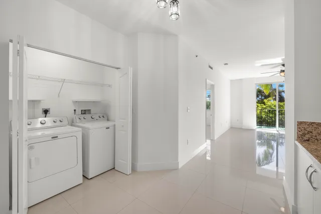 a view of hallway with washer and dryer
