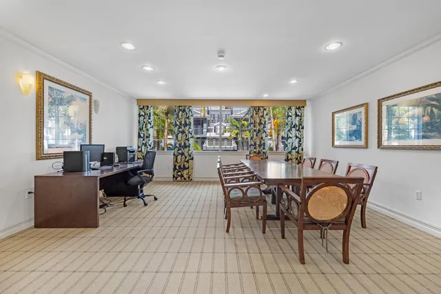 a room with gym equipment and a large window