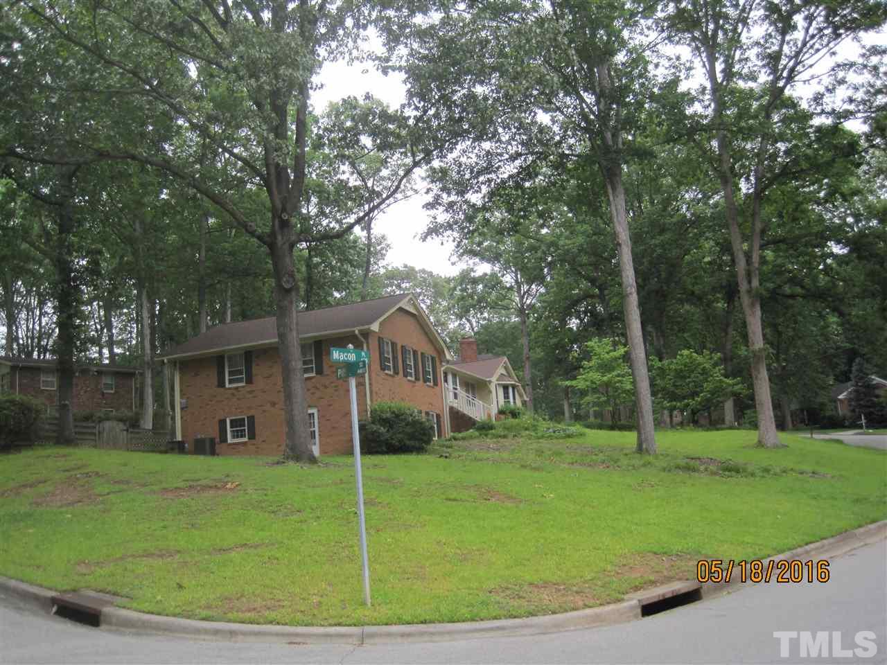 628 Macon Place Raleigh, NC 27609 - Photo 1 of 3 a view of a house with a big yard and large trees