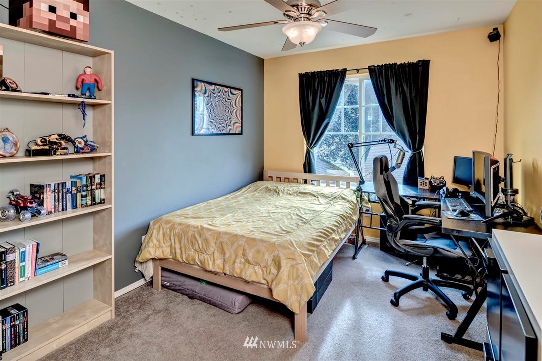 34713 Southeast Ridge Street Snoqualmie, WA 98065 - Photo 18 of 22 a bedroom with bed and a window