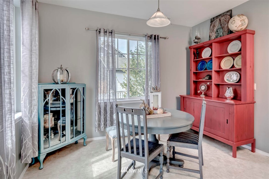 34713 Southeast Ridge Street Snoqualmie, WA 98065 - Photo 10 of 22 a view of a dining room with furniture window and outside view