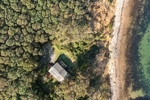 a backyard of a house with lots of green space