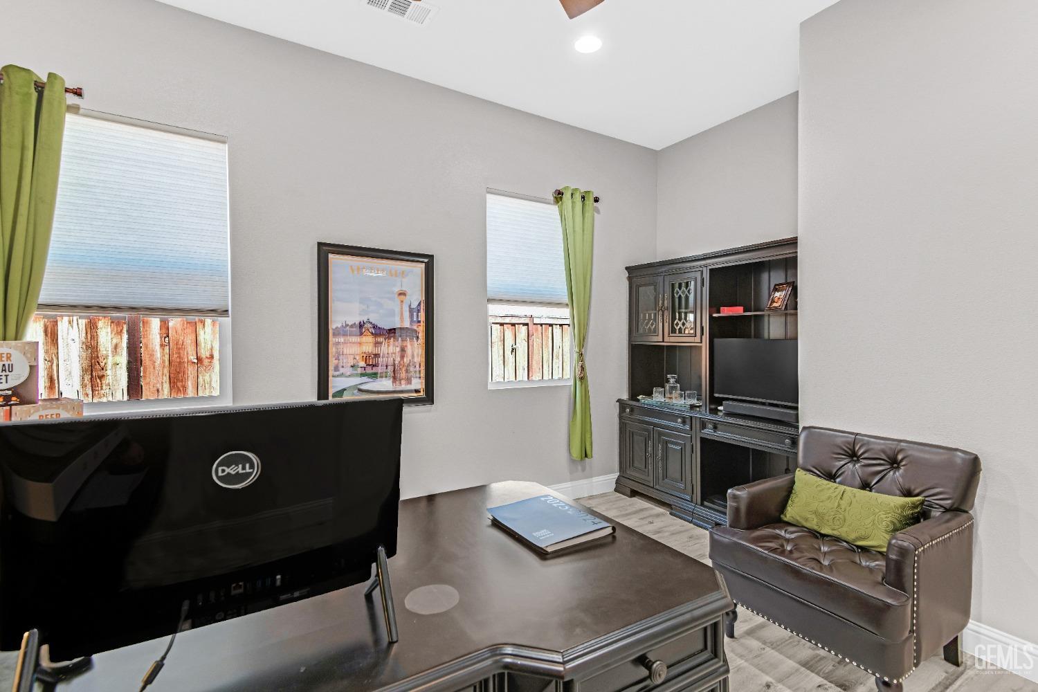 Undisclosed Address Bakersfield, CA 93306 - Photo 16 of 49 a living room with furniture and a window