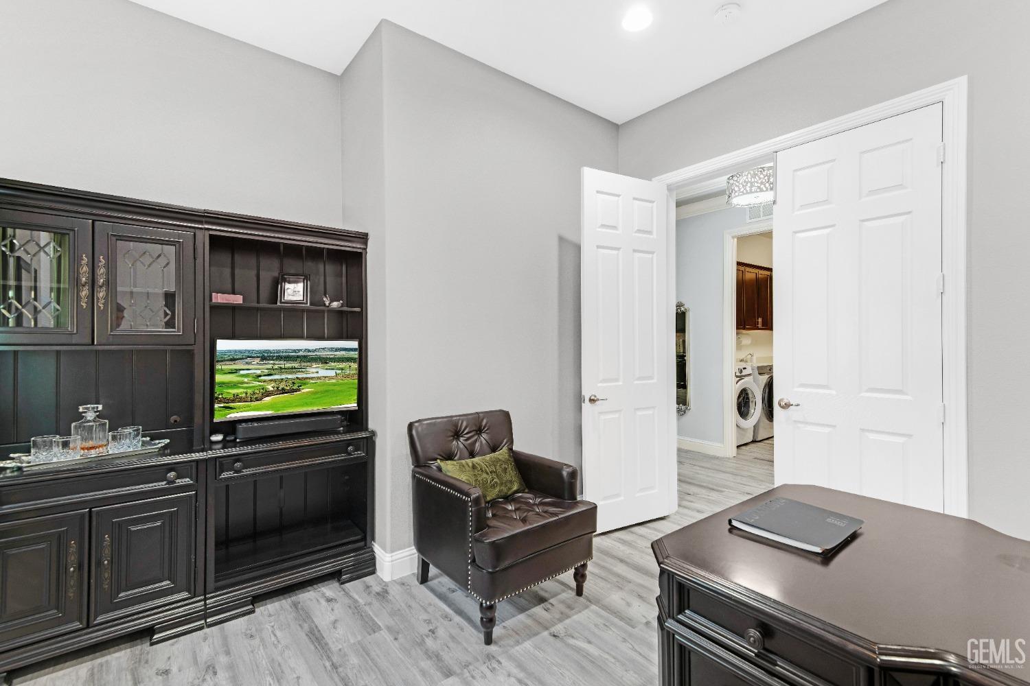 Undisclosed Address Bakersfield, CA 93306 - Photo 17 of 49 a living room with furniture and a window