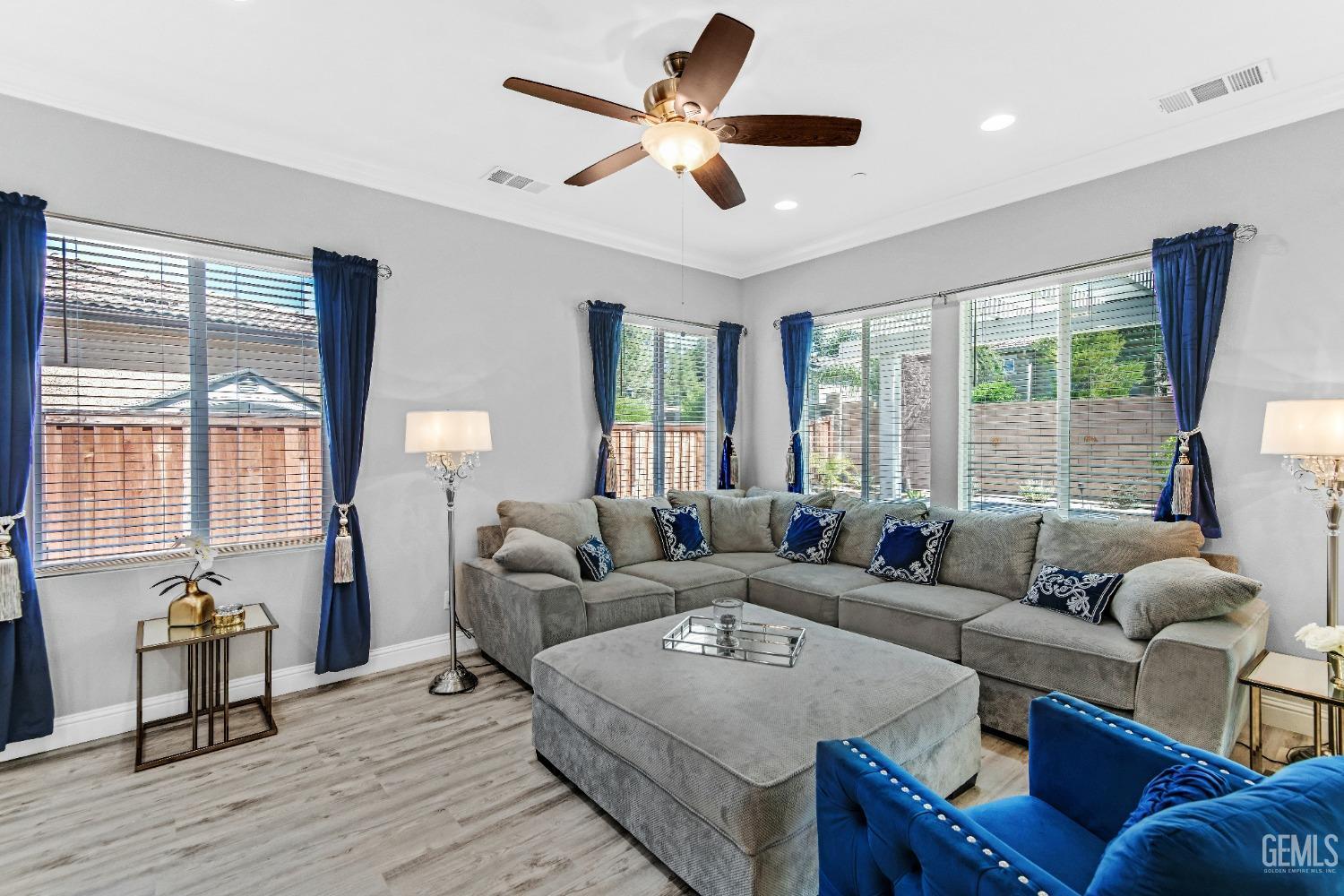 Undisclosed Address Bakersfield, CA 93306 - Photo 27 of 49 a living room with furniture and a large window