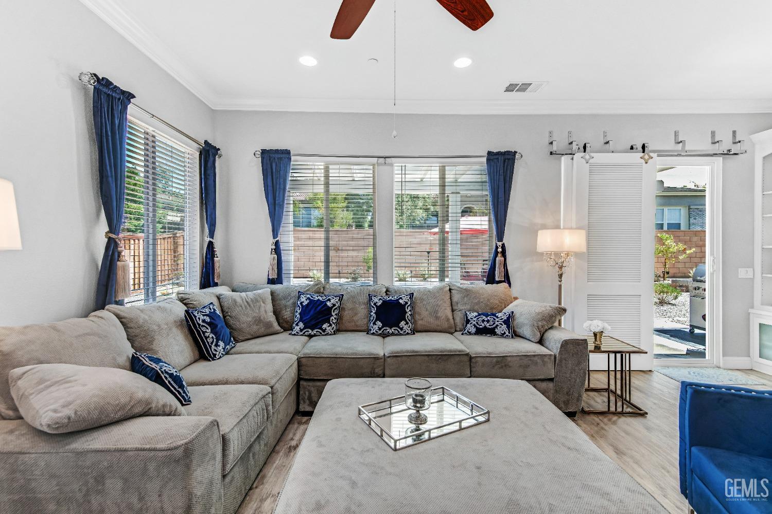 Undisclosed Address Bakersfield, CA 93306 - Photo 28 of 49 a living room with furniture and a large window