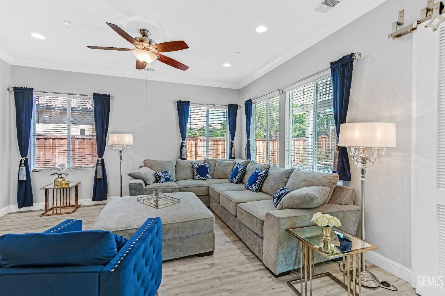 Undisclosed Address Bakersfield, CA 93306 - Photo 30 of 49 a living room with furniture and a large window