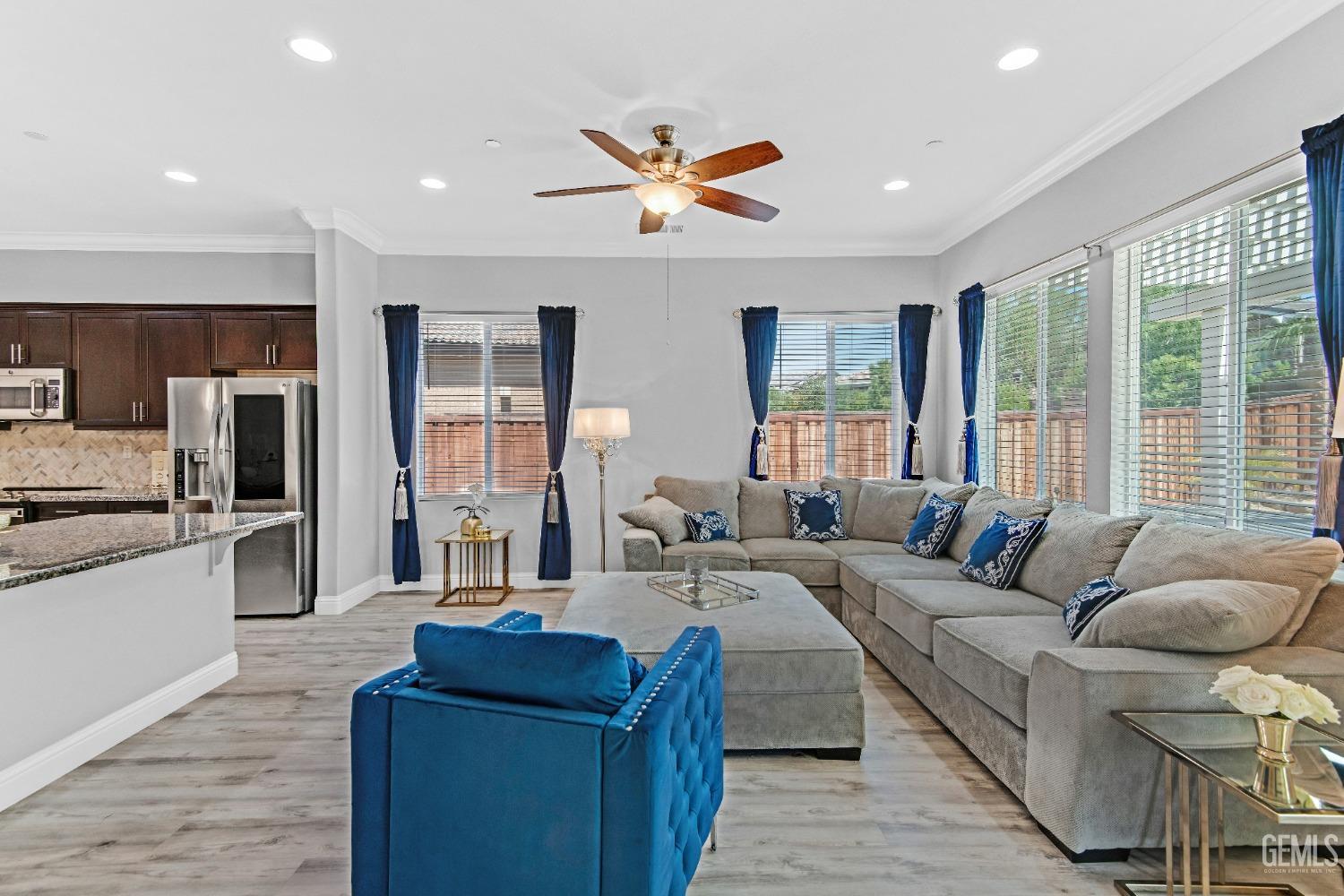 Undisclosed Address Bakersfield, CA 93306 - Photo 31 of 49 a living room with furniture and a large window