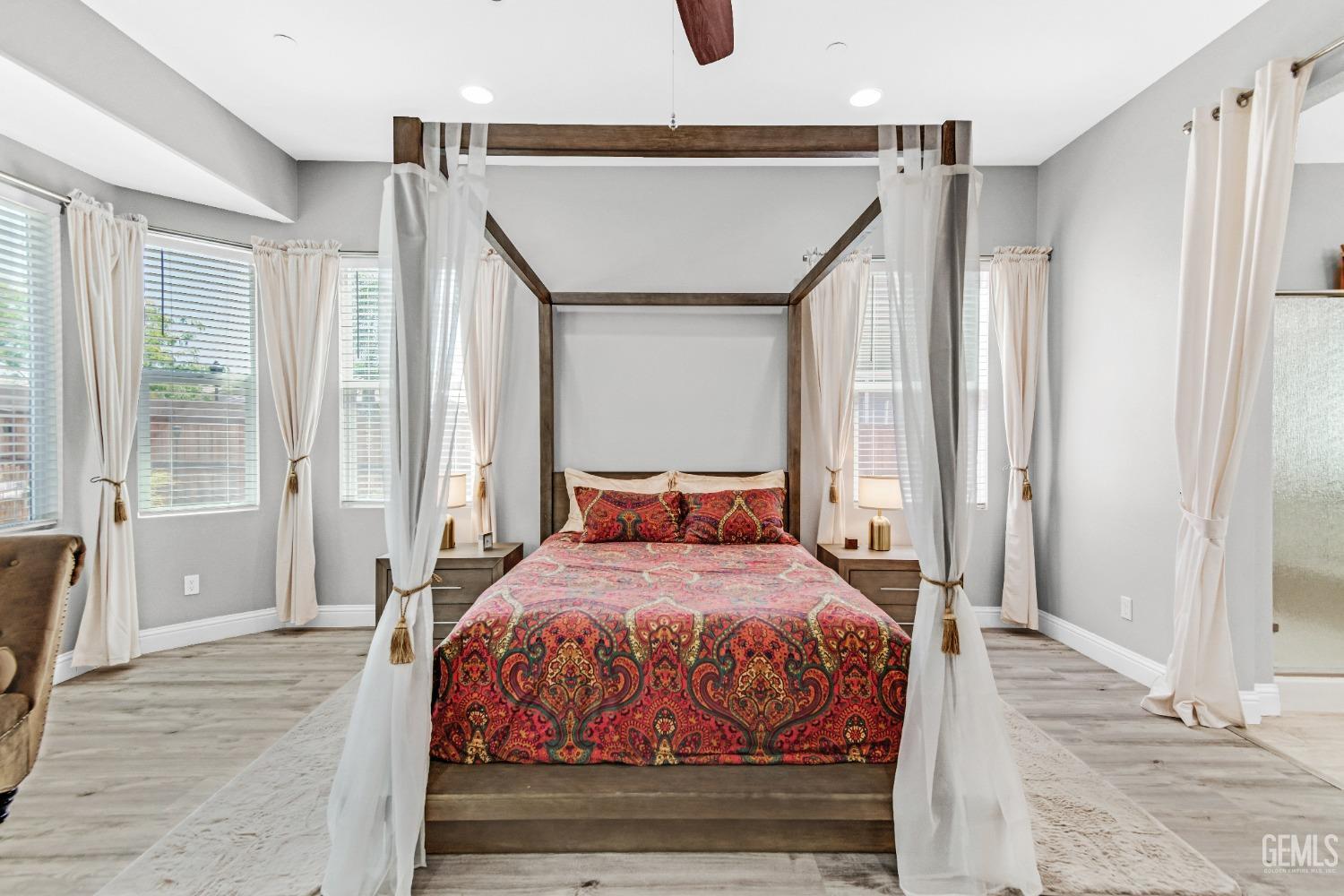 Undisclosed Address Bakersfield, CA 93306 - Photo 34 of 49 a bedroom with a bed and a window