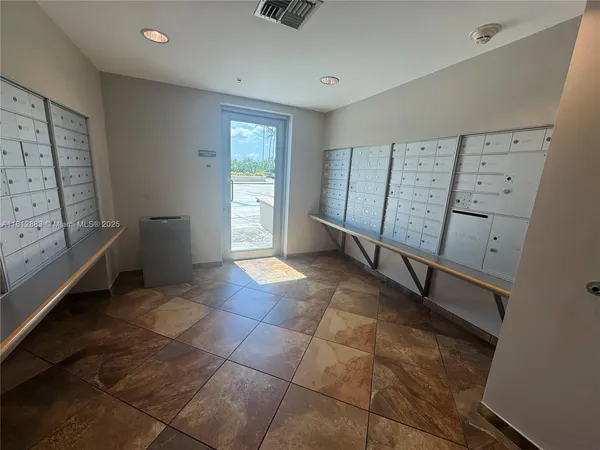 a view of entryway with a front door