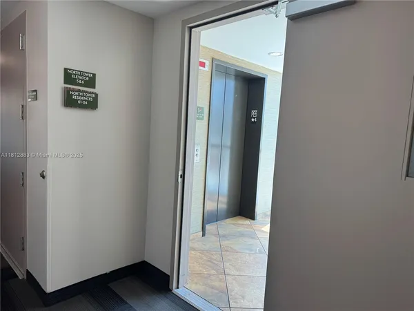 a living room with furniture a ceiling fan and a rug