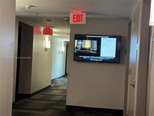 a view of a bathroom from a hallway