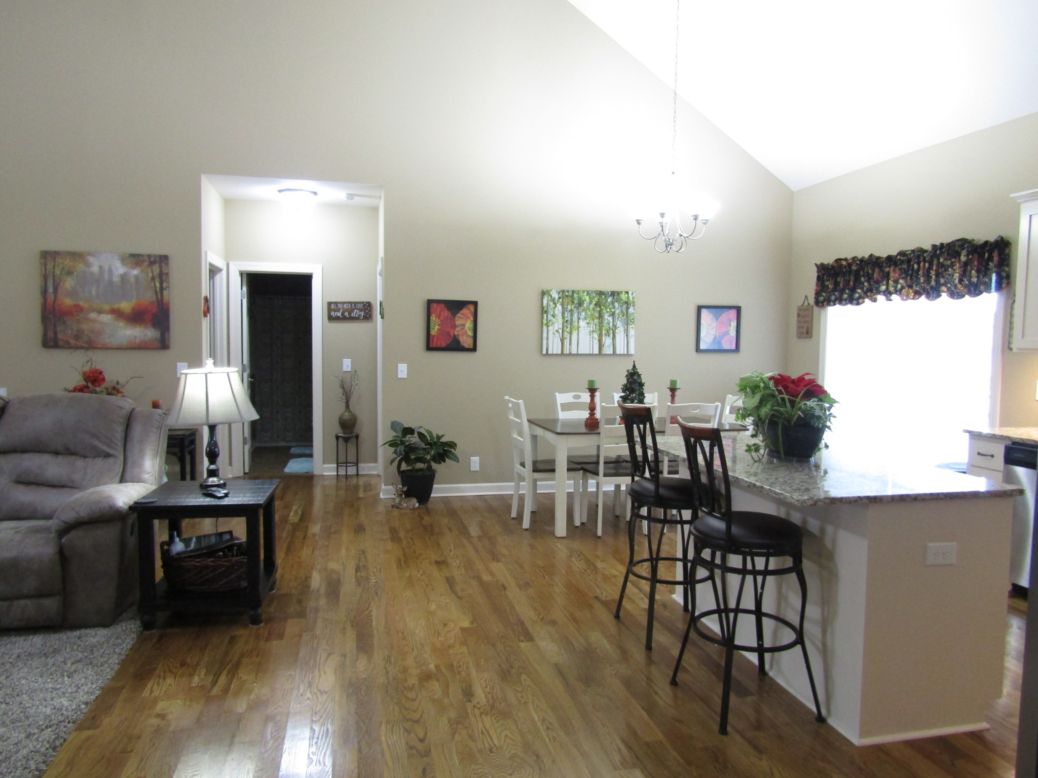 721 Elrod Road Manchester, TN 37355 - Photo 14 of 41 a living room with furniture a lamp and a large window